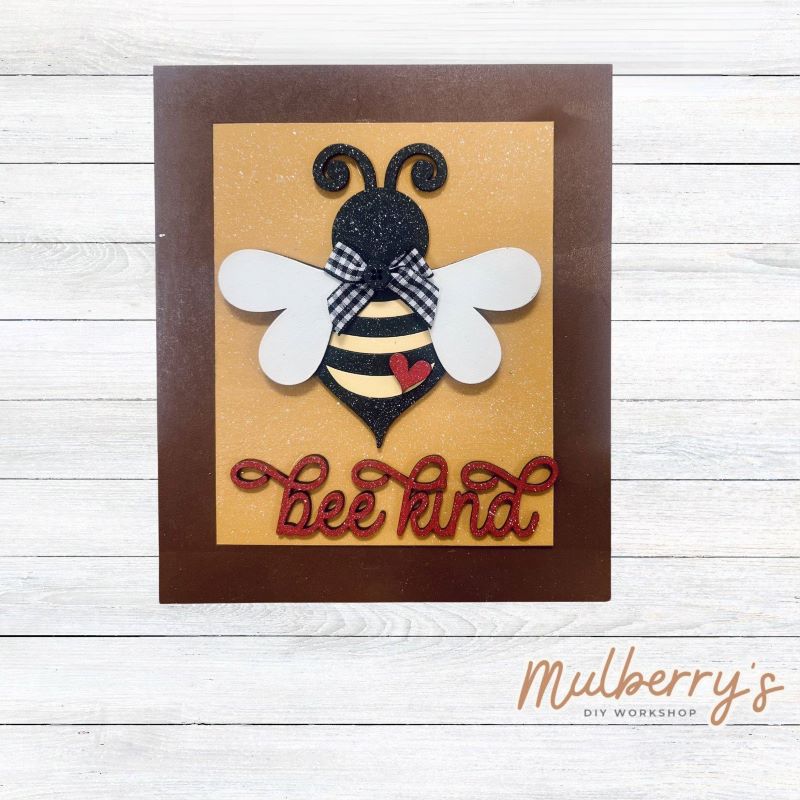 Our Interchangeable Rectangle Frame measures roughly 6.5" wide & 8" tall.

This project can easily be changed out for holidays, seasons and other themes. Because the frame leans back with the use of an easel, no magnets or adhesive hook and loop is needed.

The set includes the rectangle frame and bee kind insert.