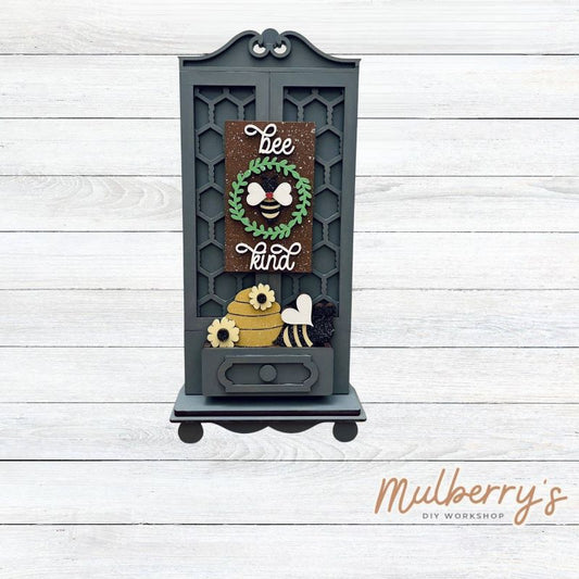 It doesn't get any cuter than our new single cottage mega shelf sitter! It's the perfect add-on accessory to your decor at approximately 15" tall by 6.5" wide.

Includes: Single Cottage and the Bee insert set pictured. If desired, the other Easter insert option set can be purchased in the subsequent product listing.
