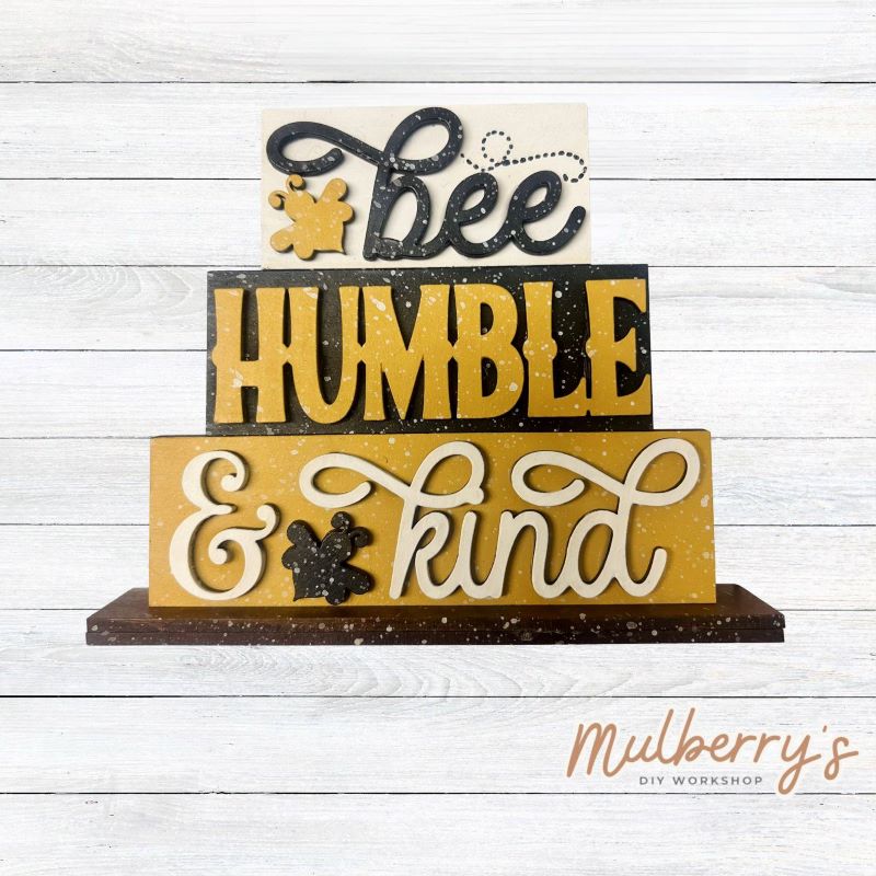 Our mini wood stackers are too cute! Approximately 5" tall by 5" wide. Includes stand.