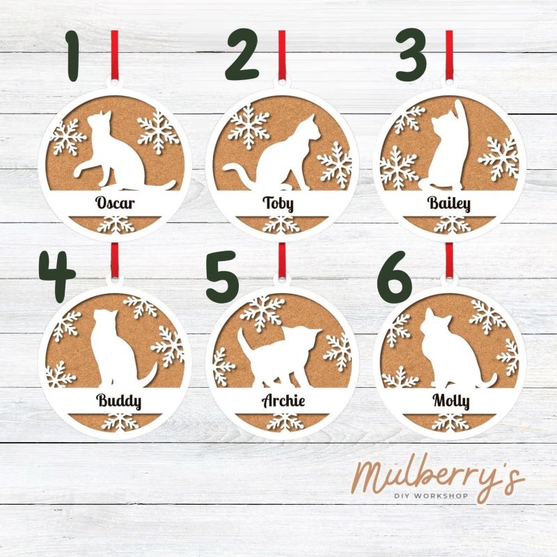 Personalized a cute ornament for your cat!&nbsp; There are six options available. The name of your cat will be engraved on the ornament in cursvie. Each ornament is approximately 4.5 inches in diameter.