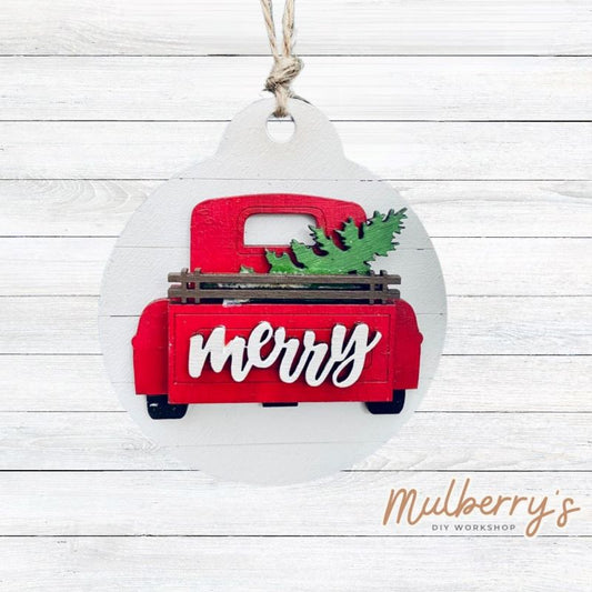 Decorate your tree with our "Christmas Farmhouse Truck" ornament! Approximately 3.5" in diameter.