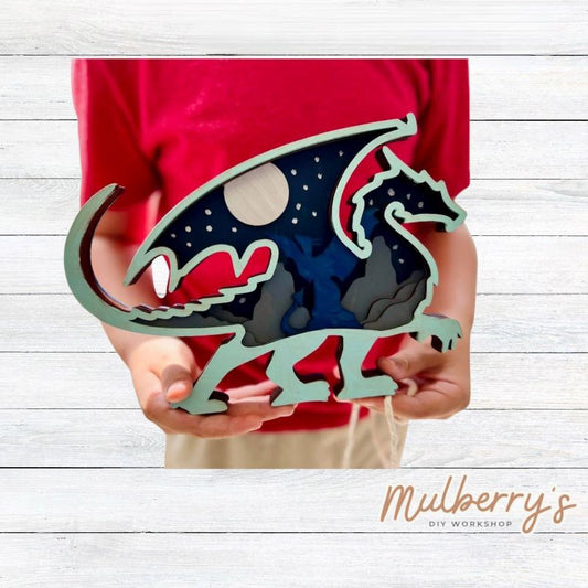 Our six-layered multilayered dragon is super fun to paint! It measures 6.5" tall by 9" wide.