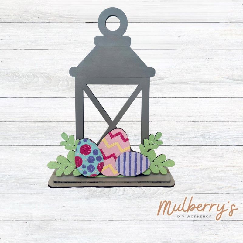 We love our interchangeable lantern! It's approximately 11" tall and can display your favorite seasonal/holiday insert.

This set includes the interchangeable lantern and the Easter insert.
