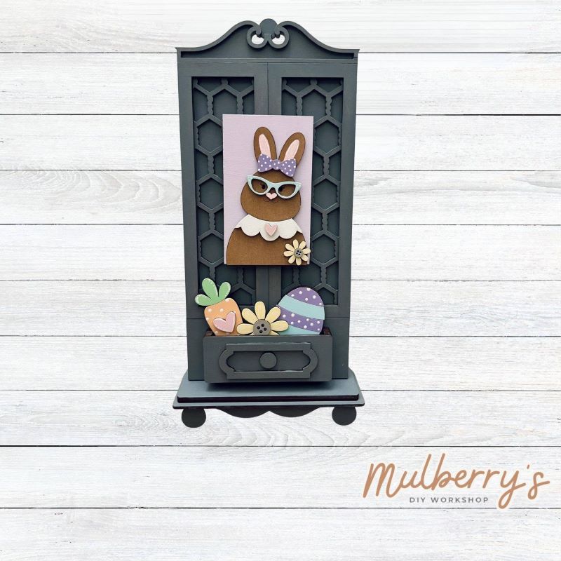 It doesn't get any cuter than our new single cottage mega shelf sitter! It's the perfect add-on accessory to your decor at approximately 15" tall by 6.5" wide.

Includes: Single Cottage and the Easter insert set pictured. If desired, the other Easter insert option set can be purchased in the previous product listing.