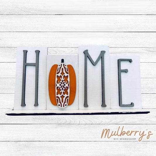 Looking for the perfect shelf sitter? Check out our interchangeable HOME shelf sitter! It's approximately 7" tall by 14" wide. Perfect for every holiday or season!  This set includes the interchangeable HOME shelf sitter base and the pumpkin insert. Additional inserts are available under Interchangeable Bases.