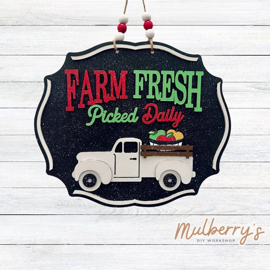 What's better than farm fresh apples? Our new apple mini door hanger measures approximately 11.5" wide by 10" tall and includes your choice of either beads or a bow.