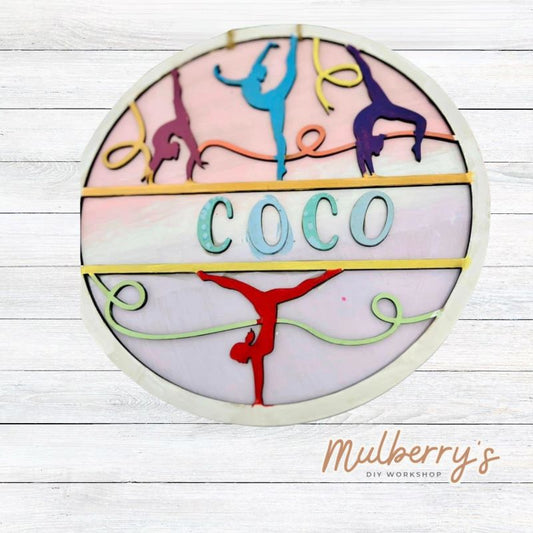 Flip upside down over our personalized gymnastics round! Approximately 9.5" in diameter. Optional stand is available.