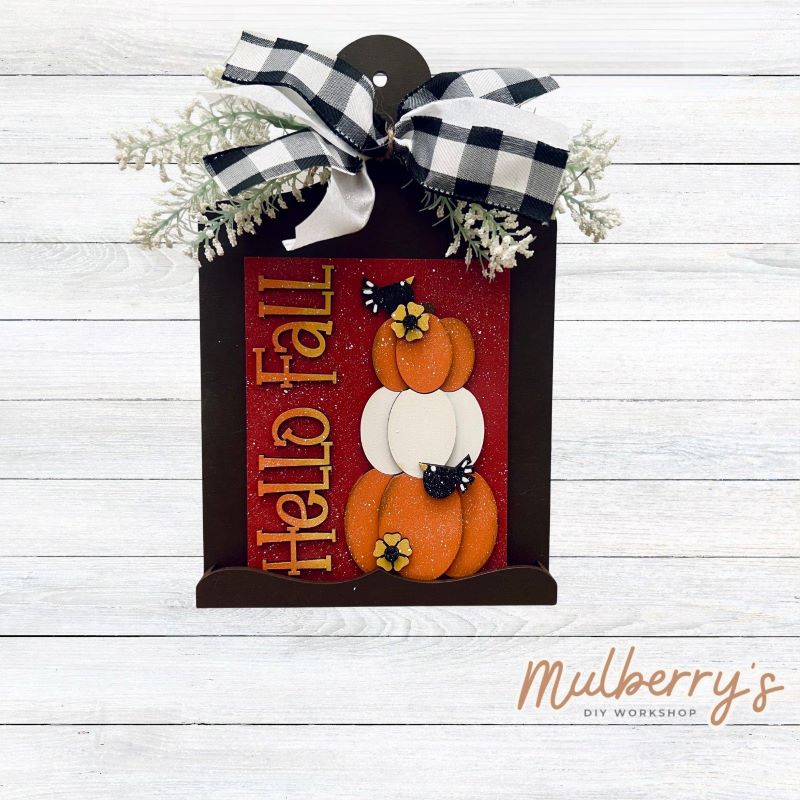 Our Interchangeable Mini Breadboard measures roughly 6.5" wide & 10.5" tall.

This project can easily be changed out for holidays, seasons and other themes. Because the breadboard leans back with the use of an easel, no magnets or adhesive hook and loop is needed.

The set includes the mini breadboard and hello fall insert.