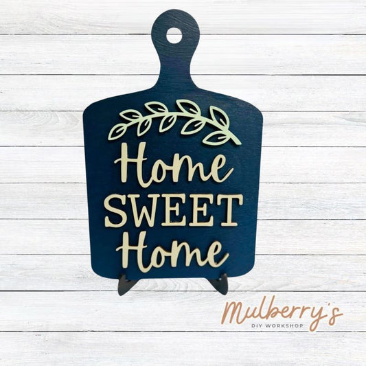 It doesn't get any sweeter than our Home Sweet Home Cutting Board! Approximately 11.5" tall by 7" wide. Optional stand is available.