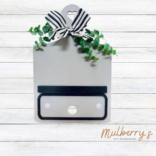 This Interchangeable Breadboard measures roughly 9" wide & 13.5" tall. This project can easily be changed out for holidays, seasons and other themes. Because the breadboard leans back with the use of an easel, no magnets or adhesive hook and loop is needed.