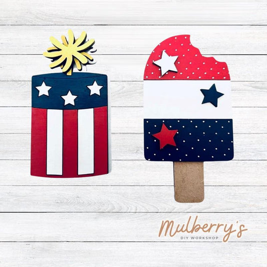 Decorate your home with our Firecracker and Popsicle inserts. Our inserts may be displayed solo or with our interchangeable gnome, which is sold separately.