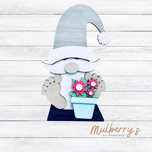 Our cute little interchangeable gnome sitter is a must! He measures 12-inches tall. Swap out his inserts to keep him ready for each holiday and season. Includes interchangeable gnome with spring insert.