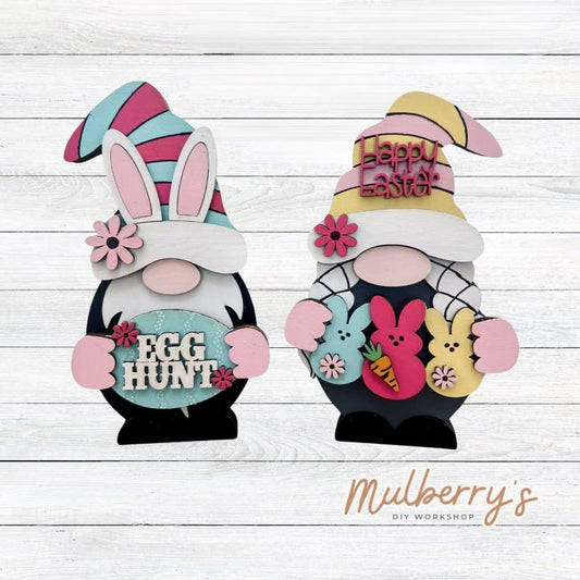 Our interchangeable mini gnomes are approximately 9" tall. They are 3 layers; therefore, they will stand freely. There are two choices. Hats and Hands are interchangeable and can be switched out for every holiday/season. Scrapbook paper embellishment is NOT included.  Includes interchangeable gnomes and Easter inserts.