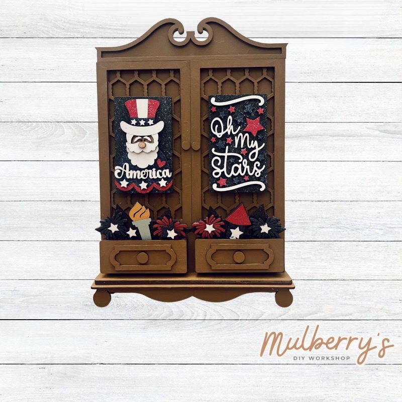 It doesn't get any cuter than our new double cottage mega shelf sitter! It's the perfect add-on accessory to your decor at approximately 16" tall by 11" wide.

Includes: Double Cottage and July 4th Inserts pictured.
