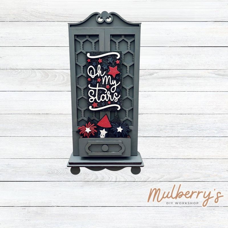 It doesn't get any cuter than our new single cottage mega shelf sitter! It's the perfect add-on accessory to your decor at approximately 15" tall by 6.5" wide.

Includes: Single Cottage and the July 4th insert set pictured. If desired, the other Easter insert option set can be purchased in the previous product listing.