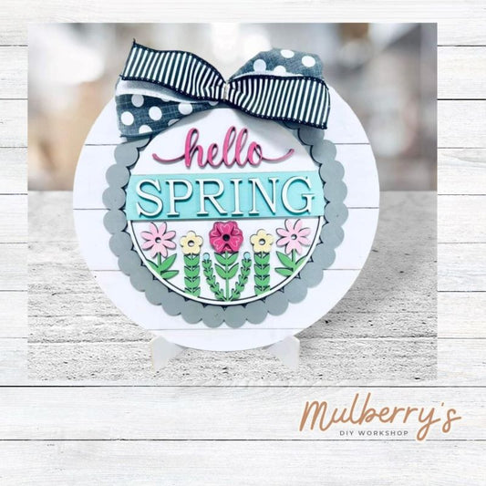 We love our large interchangeable plate with stand! It's approximately 11.5-inches is diameter and can display your favorite seasonal/holiday insert. This set includes the large interchangeable plate with stand and the hello spring flowers insert.