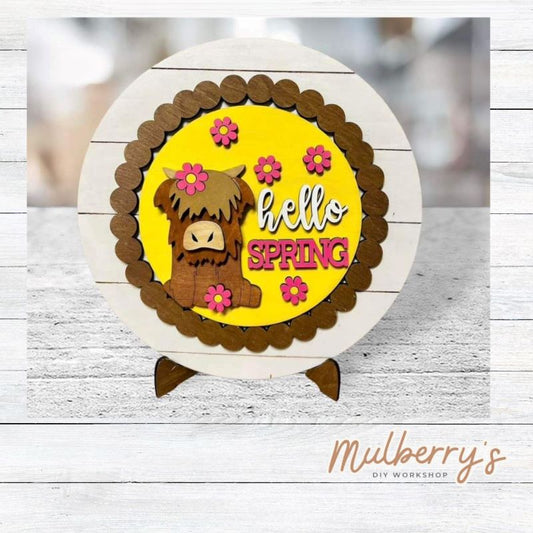 We love our large interchangeable plate with stand! It's approximately 11.5-inches is diameter and can display your favorite seasonal/holiday insert. This set includes the large interchangeable plate with stand and the highland cow spring insert.