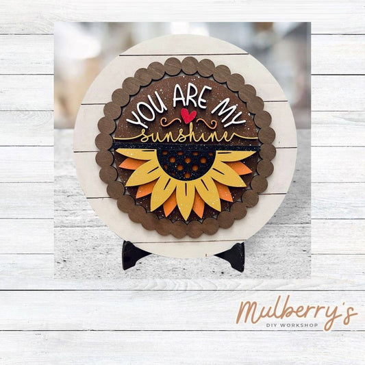 We love our large interchangeable plate with stand! It's approximately 11.5-inches is diameter and can display your favorite seasonal/holiday insert.

This set includes the large interchangeable plate with stand and the sunflower sunshine insert.