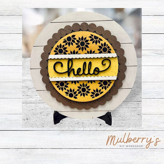 We love our large interchangeable plate with stand! It's approximately 11.5-inches is diameter and can display your favorite seasonal/holiday insert.

This set includes the large interchangeable plate with stand and the sunflower hello insert.