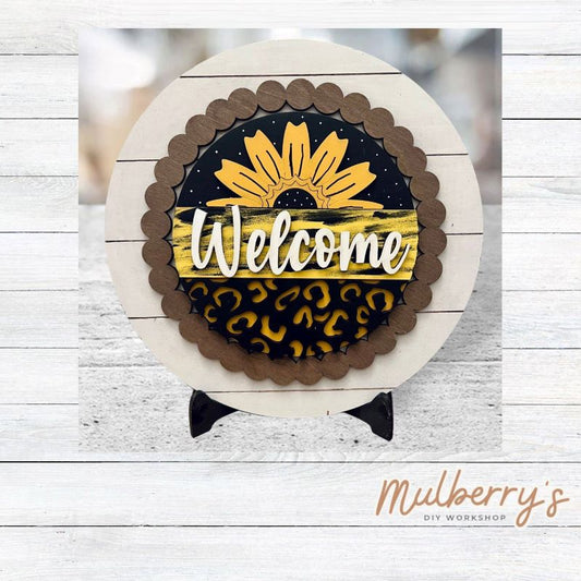 We love our large interchangeable plate with stand! It's approximately 11.5-inches is diameter and can display your favorite seasonal/holiday insert.

This set includes the large interchangeable plate with stand and the sunflower welcome insert.