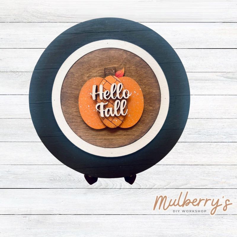 We love our mini interchangeable plate with stand! It's approximately 8-inches is diameter and can display your favorite seasonal/holiday insert. This set includes mini interchangeable plate with stand and hello fall insert.