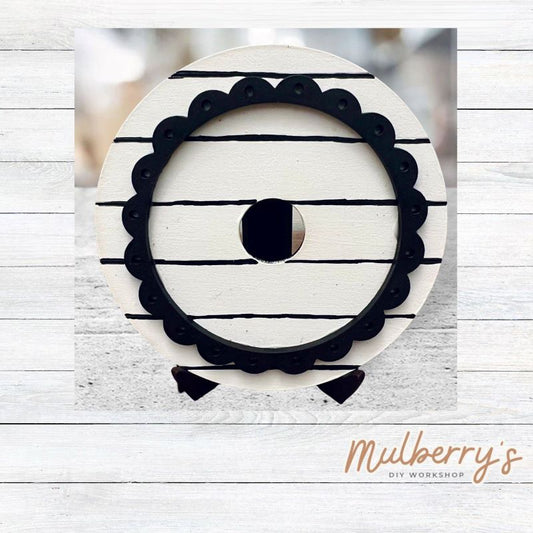 We love our mini interchangeable round with stand! It's approximately 4.5 inches in diameter and can display your favorite seasonal/holiday insert.

This listing is for the mini round stand base with scallop. We also offer mini round stand bases with circle and floral options.

Fits mini round stand base inserts as well as inserts for our interchangeable welcome office sign and interchangeable teacher notepad.