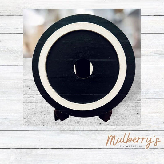 We love our mini interchangeable round with stand! It's approximately 4.5 inches in diameter and can display your favorite seasonal/holiday insert.

This listing is for the mini round stand base with circle. We also offer mini round stand bases with scallop and floral options.

Fits mini round stand base inserts as well as inserts for our interchangeable welcome office sign and interchangeable teacher notepad.