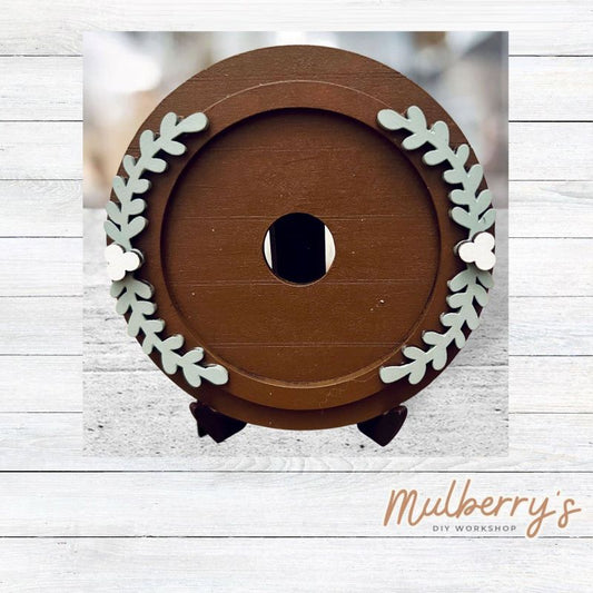 We love our mini interchangeable round with stand! It's approximately 4.5 inches in diameter and can display your favorite seasonal/holiday insert.

This listing is for the mini round stand base with floral. We also offer mini round stand bases with circle and scallop options.

Fits mini round stand base inserts as well as inserts for our interchangeable welcome office sign and interchangeable teacher notepad.