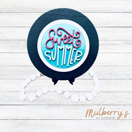 We love our mini interchangeable plate with stand! It's approximately 8-inches is diameter and can display your favorite seasonal/holiday insert. This set includes mini interchangeable plate with stand and sweet summer insert.
