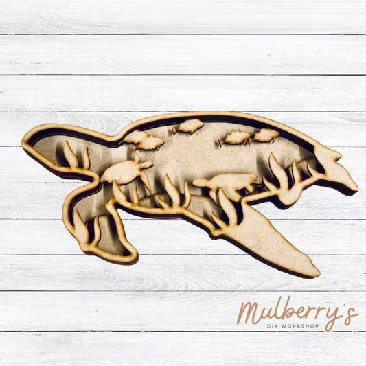 Swim away with our 5-layered sea turtle! Approximately 9.5" wide by 5" tall.