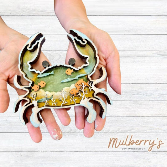 Our 5-layered crab is so crabby! Approximately 6" tall by 6" wide.