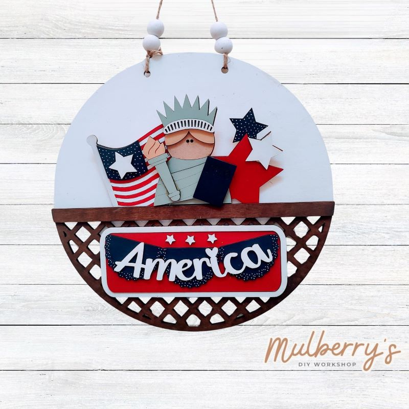 Welcome family and friends with our interchangeable lattice round door hanger! Simply swap out inserts to match the different holidays and seasons! It's approximately 10.5" in diameter.  Includes: Lattice Round Door Hanger with Patriotic Inserts. Additional inserts are available to purchase.