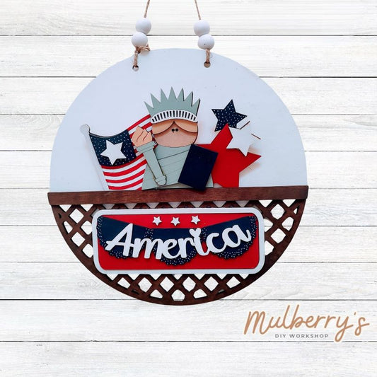 Welcome family and friends with our interchangeable lattice round door hanger! Simply swap out inserts to match the different holidays and seasons! It's approximately 10.5" in diameter.  Includes: Lattice Round Door Hanger with Patriotic Inserts. Additional inserts are available to purchase.