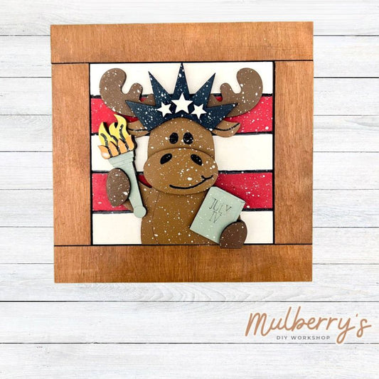Our interchangeable square frame is the perfect way to display the different seasonal and holiday decorative tiles! Choose your favorite winter decorative tile to display inside! This listing includes the base and choice of one patriotic moose insert. Approximately 6" in diameter.