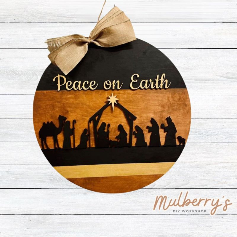 Celebrate the Christmas season with our Peace on Earth Nativity 22" door hanger!