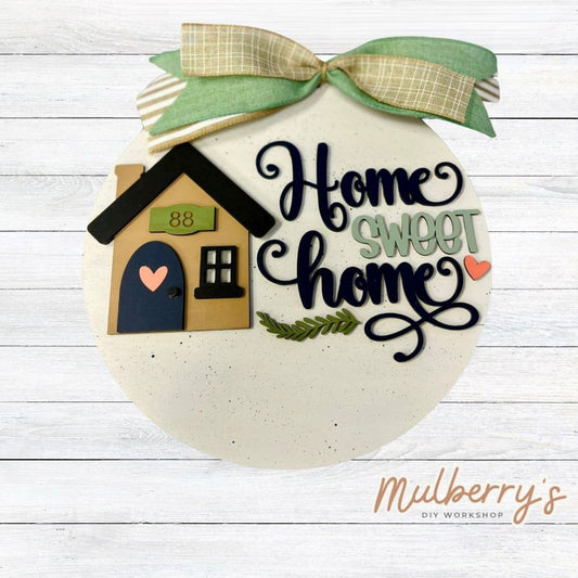 Decorate your home with our personalized home sweet home door hanger! Approximately 10.5" in diameter.