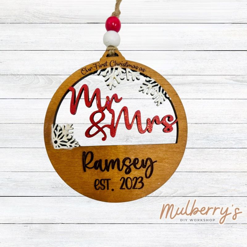 Celebrate your first Christmas together with our personalized ornament! Approximately 4.5" in diameter.