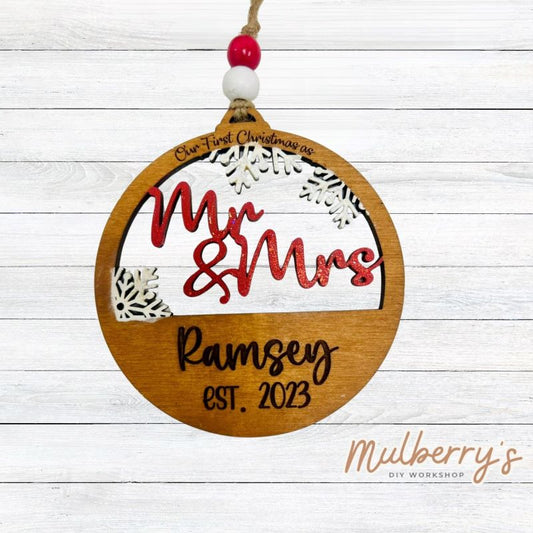 Celebrate your first Christmas together with our personalized ornament! Approximately 4.5" in diameter.
