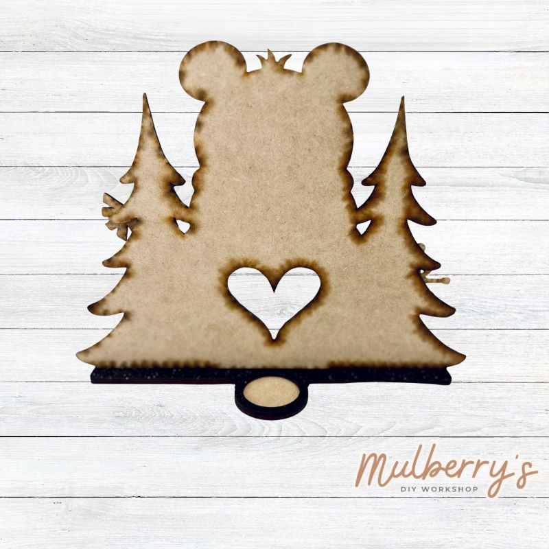 Brighten your winter days with our charming polar bear shelf sitter-designed with a perfect nook for a soft, flickering tea light. Approximately 9" tall by 11.5" wide. Includes stand base.

Please note that a physical tea light is NOT provided with this project.