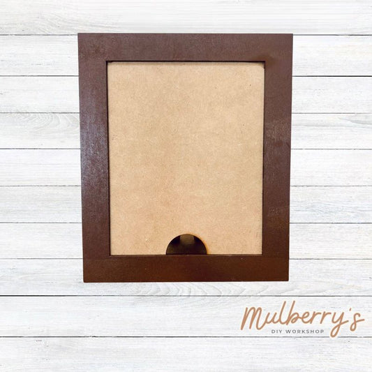 Our Interchangeable Rectangle Frame measures roughly 6.5" wide & 8" tall.

This project can easily be changed out for holidays, seasons and other themes. Because the frame leans back with the use of an easel, no magnets or adhesive hook and loop is needed.