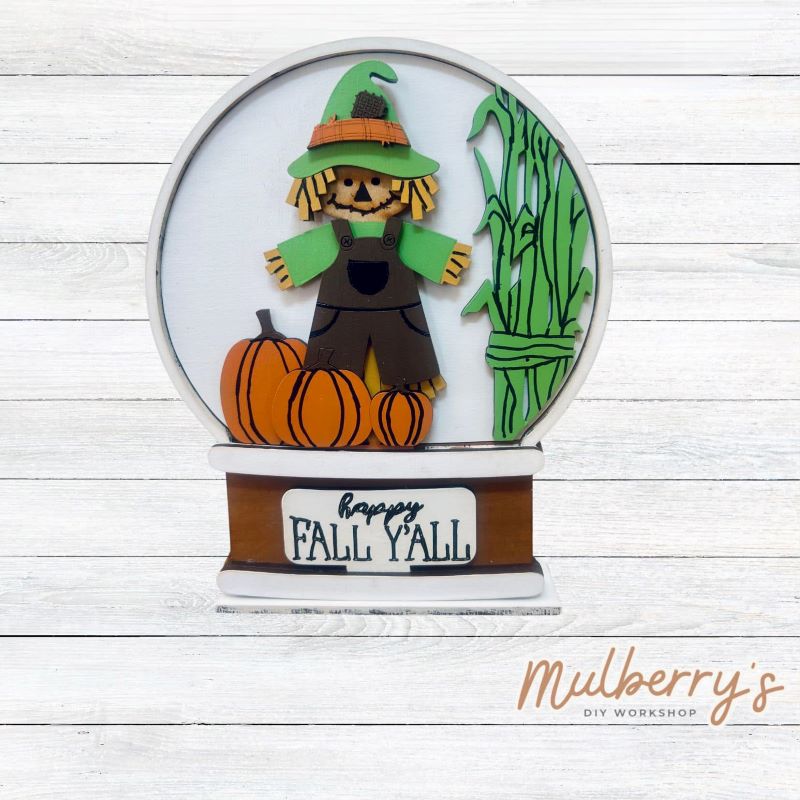 Our interchangeable mini snowglobe is the perfect addition to your seasonal decor! Simply switch out the interchangeable pieces for every holiday/season! Approximately 7" tall by 5.5" wide.