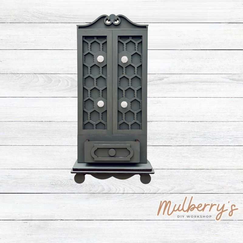 Our interchangeable single cottage is roughly 15" tall by 6.5" wide. We offer a variety of interchangeable inserts to decorate for each season and holiday.