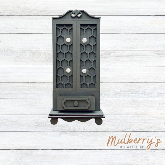 Our interchangeable single cottage is roughly 15" tall by 6.5" wide. We offer a variety of interchangeable inserts to decorate for each season and holiday.