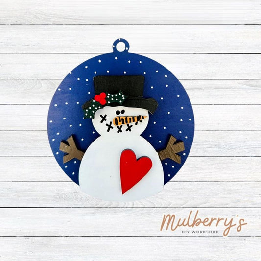 Our seasonal ornaments are great to display on your seasonal treees, tiered trays, or as gift tags! Approximately 5" in diameter.