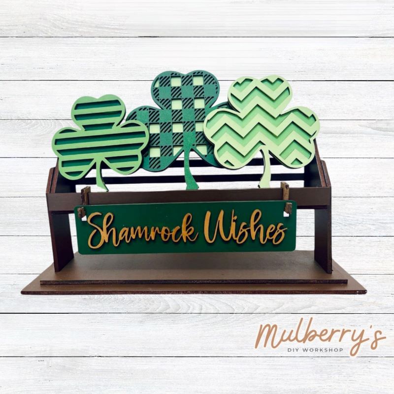 It doesn't get any cuter than our little rustic crate! It's a perfect add on accessory to your décor. It's approximately 13" long. Includes: Crate and St. Patty Inserts. St. Patty inserts include three shamrocks and Shamrock Wishes banner.