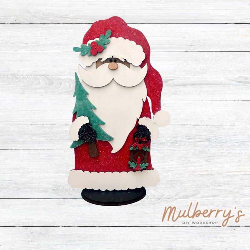 Ho Ho Ho! Get ready for Christmas with our new stand-up mega Santa shelf sitter! He's approximately 18" tall and would look great on your mantel, decked out beside your stockings!
