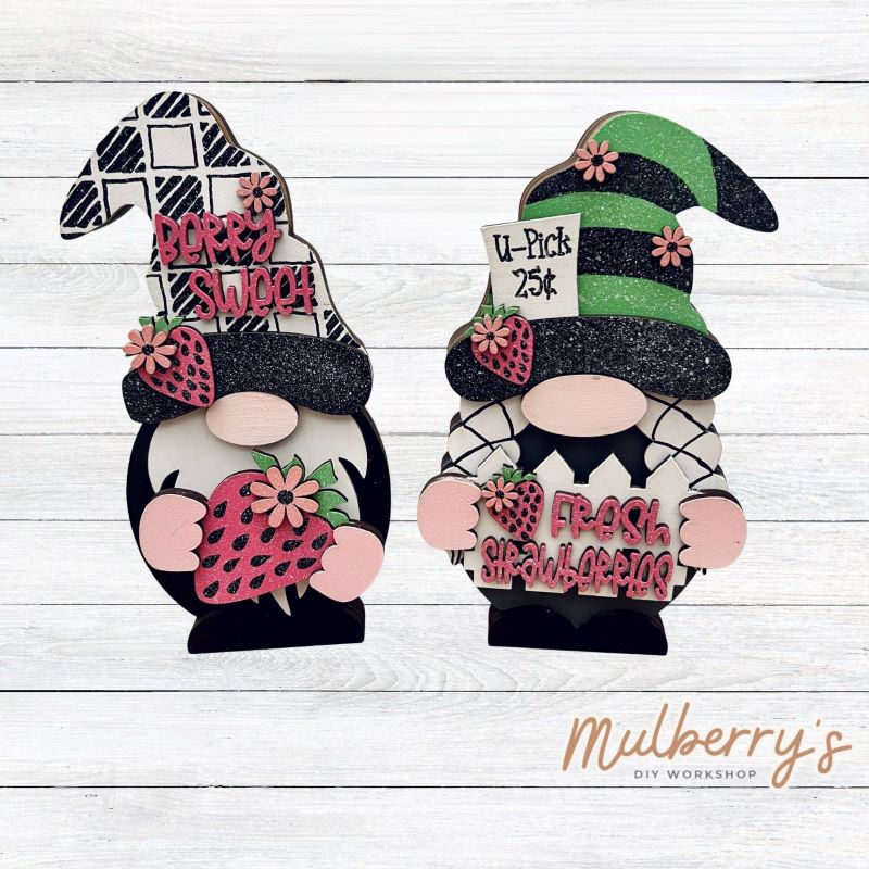 Our interchangeable mini gnomes are approximately 9" tall. They are 3 layers; therefore, they will stand freely.

There are two choices:

1. Gnome with beard

2. Gnome with braids

Hats and Hands are interchangeable and can be switched out for every holiday/season. Scrapbook paper embellishment is NOT included.

Includes interchangeable gnomes and strawberry inserts.