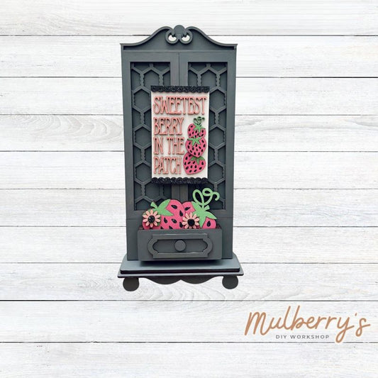 It doesn't get any cuter than our new single cottage mega shelf sitter! It's the perfect add-on accessory to your decor at approximately 15" tall by 6.5" wide.

Includes: Single Cottage and the Strawberry insert set pictured. If desired, the other Easter insert option set can be purchased in the previous product listing.