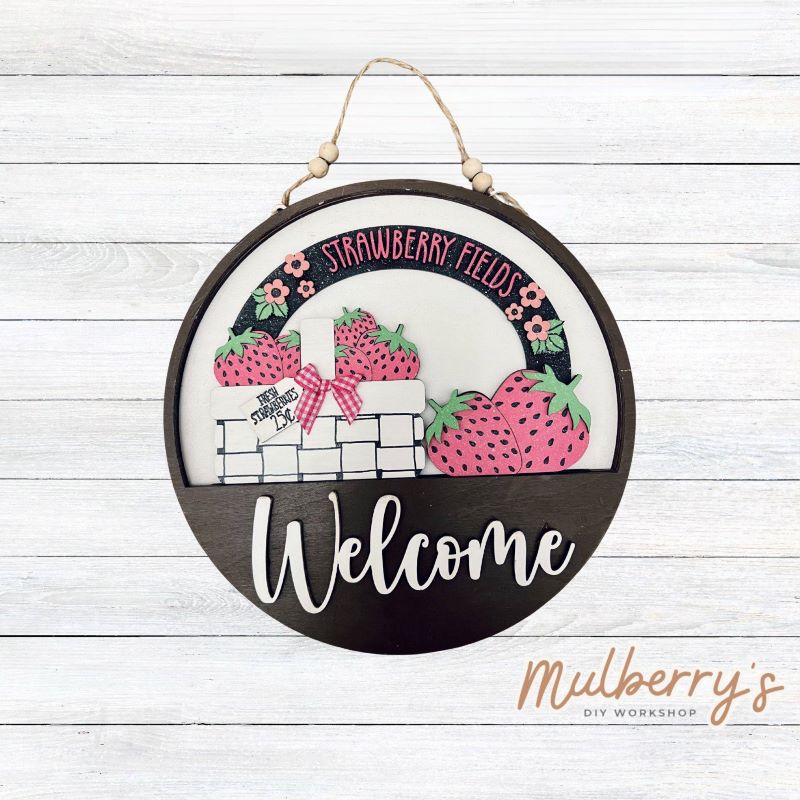 Welcome family and friends with our interchangeable welcome door hanger! Simply swap out inserts to match the different holidays and seasons!

It's approximately 10.5" in diameter.

Includes: Welcome Door Hanger with Strawberry Insert. Additional inserts are available to purchase.