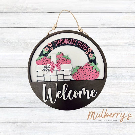 Welcome family and friends with our interchangeable welcome door hanger! Simply swap out inserts to match the different holidays and seasons!

It's approximately 10.5" in diameter.

Includes: Welcome Door Hanger with Strawberry Insert. Additional inserts are available to purchase.
